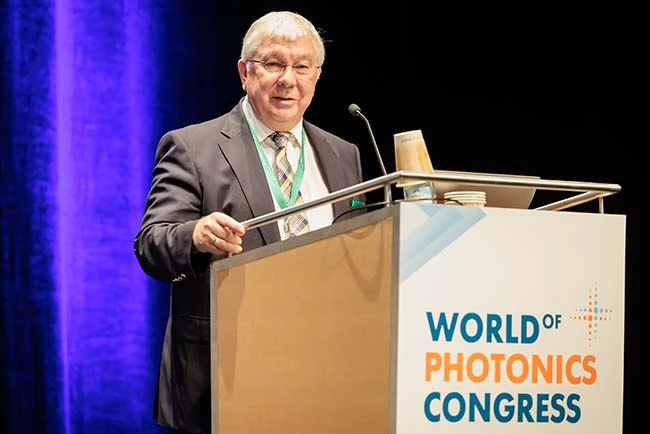 Rainer Blatt did pioneering work in quantum optics, quantum simulation and in particular laid the foundations for quantum information processing with stored ions, such as the implementation of a universal quantum gate, deterministic teleportation of quantum information and quantum error correction with up to two logical quantum bits. Furthermore, Rainer Blatt is committed to young scientists and started a number of quantum initiatives, according to the German Physical Society. “Rainer Blatt is a visionary whose influence reaches beyond quantum physics. From his work teleporting atoms and developing a universal quantum simulator to applications for spectroscopy and metrology, he continues to push the limits of the field,” said OPTICA president Satoshi Kawata. “We also commend Rainer for his efforts to bring quantum science to the general public and young students through lectures and talks. The award commemorates Max Planck Institute of Quantum Physics’ professor Herbert Walther’s groundbreaking innovations in quantum optics and atomic physics and other wide-ranging contributions to the scientific community. The Herbert Walther Award recognizes distinguished contributions in quantum optics and atomic physics as well as leadership in the international scientific community.